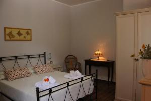 A bed or beds in a room at Villa Rosada