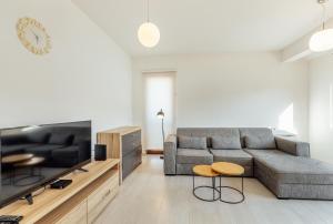 Ein Sitzbereich in der Unterkunft Doxa M Apartments
