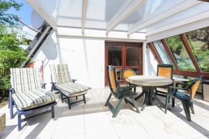 Ein Balkon oder eine Terrasse in der Unterkunft Ferienhaus Windspiel