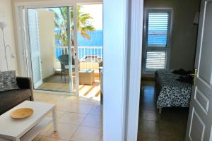 A seating area at Beautiful Ocean View Apartment