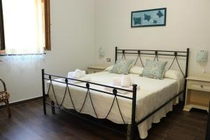 A bed or beds in a room at Villa Rosada