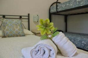 A bed or beds in a room at Villa Rosada Még 32 kép