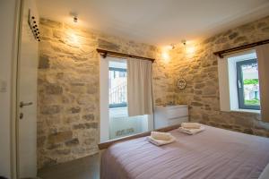 Postel nebo postele na pokoji v ubytování Villa La Mama