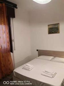 Postel nebo postele na pokoji v ubytování NEW FAMILY INN