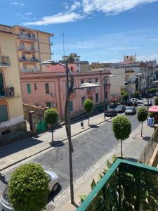 a metal sculpture of a street light on a city street at Herculaneum home in Ercolano