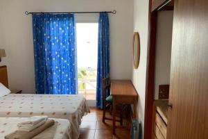 Posteľ alebo postele v izbe v ubytovaní Apartamento en Playa Santo Tomas 1-5 + 26 fotografií