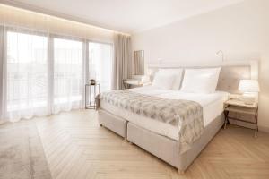 Posteľ alebo postele v izbe v ubytovaní Maritime Residence