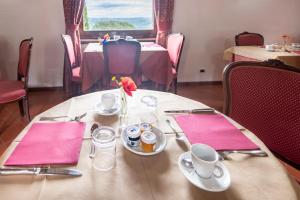 Restoran või mõni muu söögikoht majutusasutuses Hotel Vecchia Oliviera