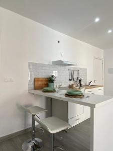Kuchyň nebo kuchyňský kout v ubytování Apartamentos CEO - Remedios