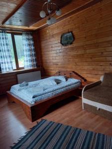 Postel nebo postele na pokoji v ubytování Садиба "Коренюки" + 93 fotografií