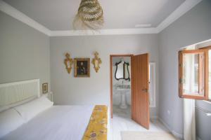 Posteľ alebo postele v izbe v ubytovaní Villa Dora (Only adults)