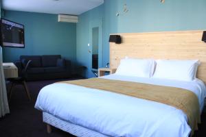 Postel nebo postele na pokoji v ubytování Mon Hotel à Gap