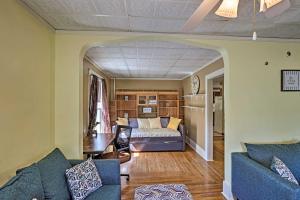 a living room with a couch and a bed at Pet-Friendly Finger Lakes Home Near Wineries! in Ovid