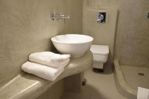 Ванная комната в Kamara Residence & Suites