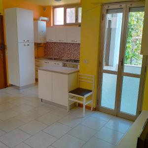 Kuchyň nebo kuchyňský kout v ubytování La Casa vicino al Parco