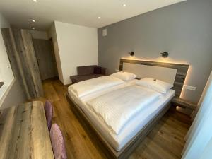 Voodi või voodid majutusasutuse Hotel Kosel garni UG toas