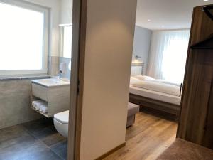 Voodi või voodid majutusasutuse Hotel Kosel garni UG toas