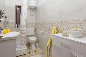 Koupelna v ubytování Apartman Miranda + 30 fotografií