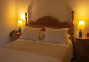 Voodi või voodid majutusasutuse El Reloj Hotel toas