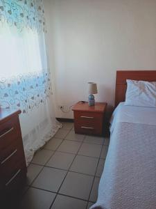 Posteľ alebo postele v izbe v ubytovaní casa giardino