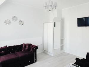 TV a/nebo společenská místnost v ubytování Solar Bed & Breakfast