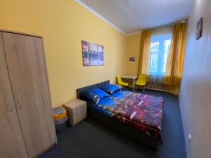 Posteľ alebo postele v izbe v ubytovaní Bon Voyage Apartments