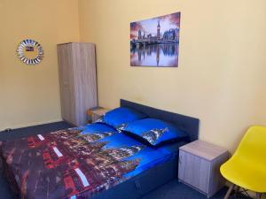 Posteľ alebo postele v izbe v ubytovaní Bon Voyage Apartments