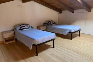 Tempat tidur dalam kamar di Cuile Nanni D'Oro