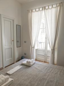 Foto dalla galleria di Dafni e Naide a Cefalù