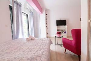 Postel nebo postele na pokoji v ubytování ΒΟΛΤΑΚΙ στην καρδια της Πρεβεζας