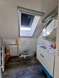 Ένα μπάνιο στο Ferienwohnung Otschik