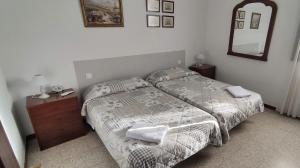 Postel nebo postele na pokoji v ubytování El Rancho Grande - Apartamento