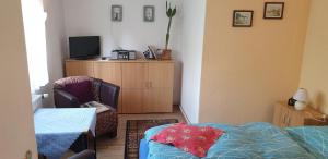 Postel nebo postele na pokoji v ubytování Ferienwohnung Parkstraße + 6 fotografií