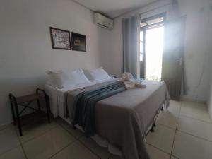 En eller flere senge i et værelse på Village Funchal 01