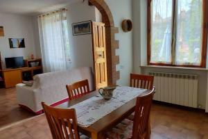 A seating area at L' Agave - Appartamento nel cuore del Chianti