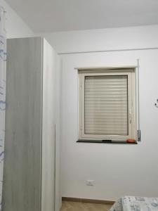 Postel nebo postele na pokoji v ubytování AL FARO