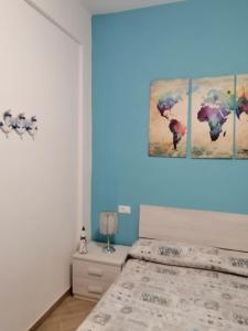Postel nebo postele na pokoji v ubytování AL FARO