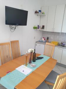 Kuchyň nebo kuchyňský kout v ubytování Apartments Mašić