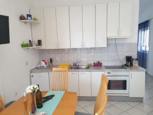 Ett kök eller pentry på Apartments Mašić