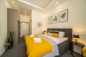 Ein Bett oder Betten in einem Zimmer der Unterkunft Elenas Rooms & Apartment