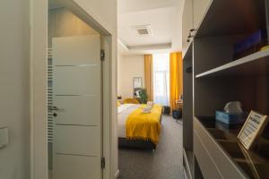 Ein Bett oder Betten in einem Zimmer der Unterkunft Elenas Rooms & Apartment