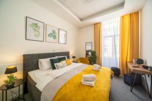 Katil atau katil-katil dalam bilik di Elenas Rooms & Apartment