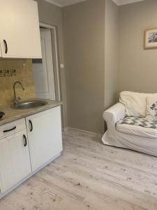 Kuchyň nebo kuchyňský kout v ubytování Domki i Apartamenty El-Piero