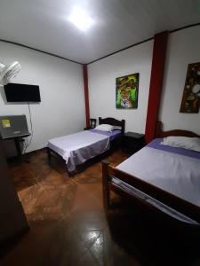 Hostal Selvatrip客房内的一张或多张床位