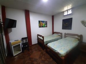 Hostal Selvatrip客房内的一张或多张床位