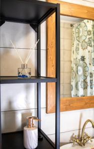 a black shelf with a sink and a sink at Samaradiko Limnos in Kondiás +46 photos