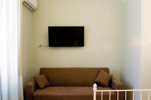 TV a/nebo společenská místnost v ubytování B&B Affittacamere Trigona