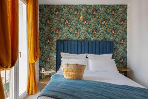 Een bed of bedden in een kamer bij Hôtel & Résidence San Roccu