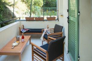 Een balkon of terras bij Hôtel & Résidence San Roccu