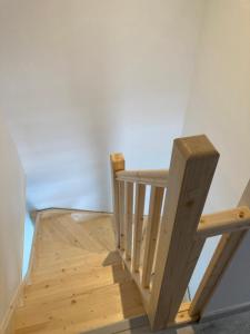 a wooden staircase in a room at Bel Air 1 in Fougeré